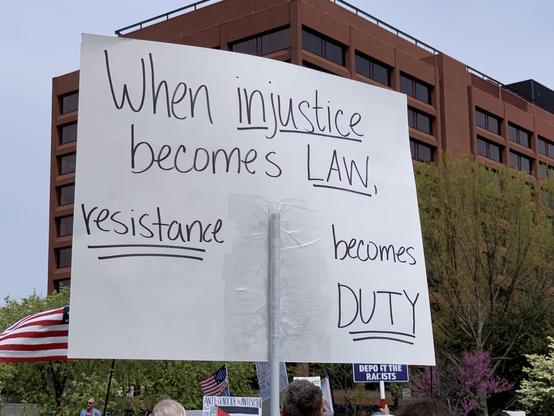 Protest sign: When injustice becomes law, resistance becomes duty