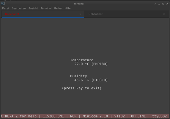 Screenshot of an minicom serial session, connected to yn ESP32 microcontroller, running a simple thermometer code written in ESP32forth. The Screen shows the following text, which is centered to fit in the middle of the screen:

Temperature
22.0 °C (BMP180)

Humidity
41.6 % (HTU31D)

(press key to exit)