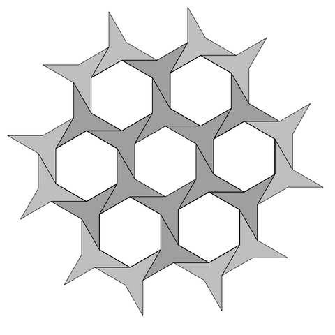 A pattern of grey three-pointed stars with hexagonal gaps.