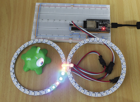 Photo of the test setup with an ESP32 DevKit and two LED rings