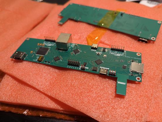 Two PCBs on an anti-static foam pad, (there are 3 more on more pads under it). Fresh from JLCPCB, these are prototypes of an IP-KVM.