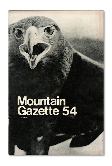 Issue 54 features an extreme close-up photo in black-and-white of a falcon in flight. Taken from a face forward vantage point, you can see its piercing eyes and open mouth.