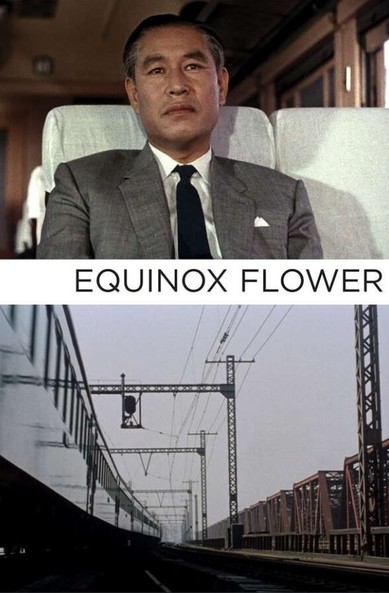A promotional poster for the movie “Equinox Flower” shows actor Shin Saburi, wearing a well tailored suit, sitting on a train, deep in contemplation.