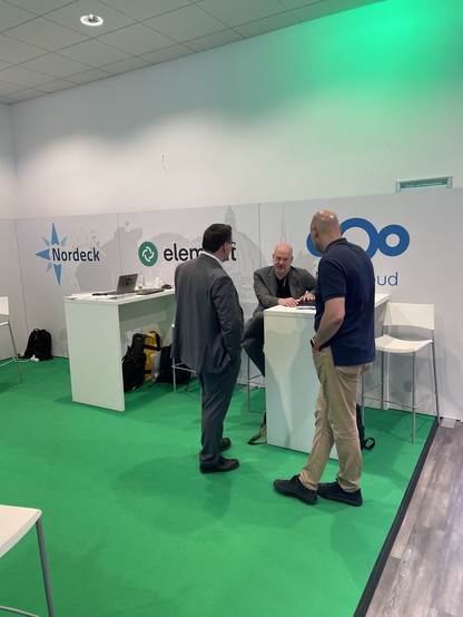 Nextcloud CEO & Founder Frank Karlitschek at our booth speaking with attendees at the Forum.