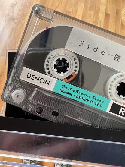 A closeup photo of the actual cassette tape.
