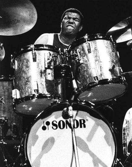 Iconic black-and-white photo of Jack DeJohnette playing his signature Sonor drums.