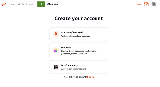 Screenshot of a 'Create your account' page on Fluffys flohmarkt website. Three registration options are shown: 'Username/Password' with an orange person icon to register with email and password, 'FediAuth' with a colorful interconnected nodes logo (the Fediverse symbol) to sign in with a Fediverse account (Mastodon, Pleroma, PixelFed, etc.), and 'Our Community' with a black and white custom logo to use a community account. At the bottom is a 'Sign in' link for existing users.