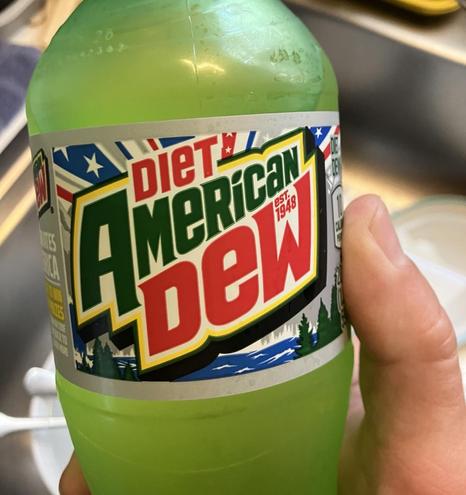 A bottle of Diet Mountain Dew, except the label says “American Dew” as some attempt at patriotic pandering for the 250th