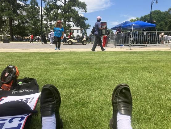 My feet as I sit on the lawn outside the Alabama state capitol. We found some shade and the grass is lovely