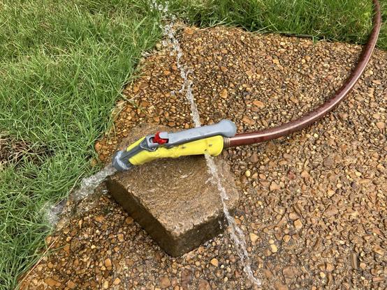 A Chapin G362D hose end sprayer. It’s attached to a hose that’s turned on and water is spewing out of two holes that appear to be overflow valves. If I remove the tank, this still happens and also water shoots out of the nozzle. The handle is not depressed and the red knob is extended all the way out, so it’s not holding the valve open.