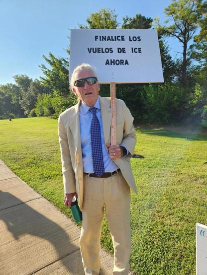 A protestor stands outside of Wilson Air at Memphis International Airport (KMEM), August 4, 2026. Courtesy Hunter Demster 