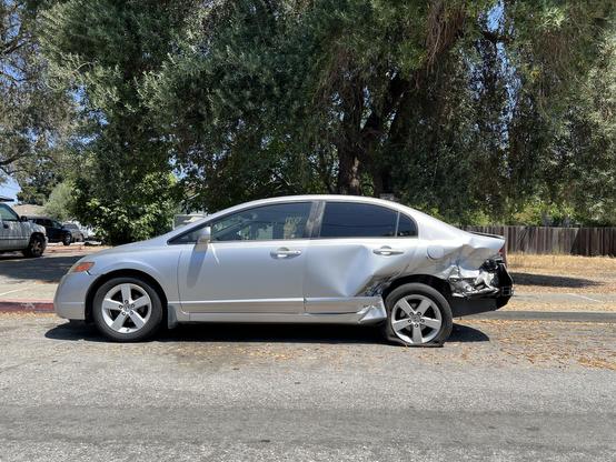 Another blobby silver Honda Civic has taken one for the team… in the butt.